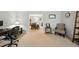 Comfortable living room with carpet flooring, neutral paint, and dining area at 1 Saturn Court Ct, Durham, NC 27703