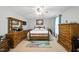 Relaxing main bedroom with ample natural light, ceiling fan and comfortable furnishings for peaceful retreats at 1 Saturn Court Ct, Durham, NC 27703