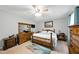 Relaxing main bedroom with ample natural light, ceiling fan and comfortable furnishings for peaceful retreats at 1 Saturn Court Ct, Durham, NC 27703