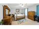 Relaxing main bedroom with ample natural light, ceiling fan and comfortable furnishings for peaceful retreats at 1 Saturn Court Ct, Durham, NC 27703