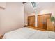 Bright bedroom with vaulted ceiling, skylight, and two closets at 1012 King Cir, Chapel Hill, NC 27516