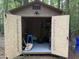 Shed interior showing ample storage capacity for yard equipment and miscellaneous items, providing organization and convenience at 1012 King Cir, Chapel Hill, NC 27516