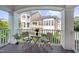 Charming balcony with seating, offering a relaxing outdoor space with scenic community views at 10330 Sablewood Dr # 104, Raleigh, NC 27617