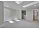 Versatile bonus room featuring carpet floors, skylights, and ensuite bathroom at 10330 Sablewood Dr # 104, Raleigh, NC 27617