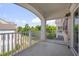Outdoor patio with white railing offers stunning neighborhood views at 10330 Sablewood Dr # 104, Raleigh, NC 27617
