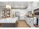 Bright, modern kitchen with a large island, stainless steel appliances, and a convenient layout at 1050 Southern High School Rd, Burlington, NC 27215