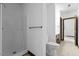 Bathroom with walk-in shower, toilet and bronze fixtures with tile flooring at 106 Autumn Cir, Cary, NC 27518