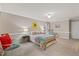 Large bedroom with neutral walls, cozy carpet, and colorful decor providing a comforting ambiance at 106 Autumn Cir, Cary, NC 27518