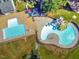 An aerial view of the community pool and water park showcasing fun for the entire Gathering at 108 Holly Glen Ct, Holly Springs, NC 27540