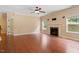 Comfortable living room with hardwood floors, fireplace, and lots of natural light at 108 Holly Glen Ct, Holly Springs, NC 27540