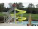 Community pool water slide, perfect for summer fun at 108 Holly Glen Ct, Holly Springs, NC 27540