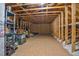 Large unfinished attic space with exposed beams and insulation, offering potential for storage or conversion at 109 Box Elder Way, Zebulon, NC 27597