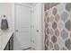 Bathroom area showing an interior closet and partial view of the shower at 109 Box Elder Way, Zebulon, NC 27597