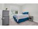 Cozy bedroom featuring a plush bed, window for natural light, and ample space at 109 Box Elder Way, Zebulon, NC 27597