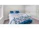Well-lit bedroom featuring a bed, natural light, and a closet area at 109 Box Elder Way, Zebulon, NC 27597