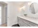 A spacious bathroom with double vanity, gray cabinets, white countertop and modern fixtures at 109 Murdock Creek Ct, Cary, NC 27519