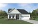 Charming single-story home featuring stone accents, a two-car garage, and a well-manicured lawn at 1102 Red Roses Ave, Durham, NC 27703