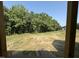View of a large backyard from a porch at 111 Hot Springs Way, Benson, NC 27504