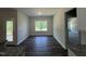 The dining room features access to a deck for outdoor dining and large windows at 111 Hot Springs Way, Benson, NC 27504