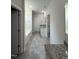 This is the main bathroom with tile flooring, tub, and a vanity with granite countertops at 111 Hot Springs Way, Benson, NC 27504