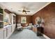 Bonus room features built-in shelving, plush carpet, and natural light at 1133 Heritage Greens Dr, Wake Forest, NC 27587