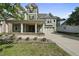 Charming two-story home with covered porch, columns, flower boxes, and an attached garage at 1133 Heritage Greens Dr, Wake Forest, NC 27587