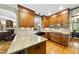Well-equipped kitchen with granite counters, tiled backsplash, and modern appliances at 1133 Heritage Greens Dr, Wake Forest, NC 27587