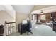 Hallway featuring a desk space and an open view to the bonus room at 1133 Heritage Greens Dr, Wake Forest, NC 27587