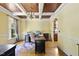 Elegant office with coffered ceilings, custom millwork, and a large window for natural light at 1133 Heritage Greens Dr, Wake Forest, NC 27587