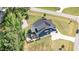 Aerial view showcases a home's layout, yard, screened in porch, deck and surrounding neighborhood at 119 Florentino Ct, Clayton, NC 27527