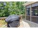 View of the grill and screened-in back deck perfect for entertaining and enjoying the weather at 119 Florentino Ct, Clayton, NC 27527