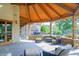 Beautifully crafted back patio with stone pillars and ceiling beams offering the perfect outdoor oasis at 119 Florentino Ct, Clayton, NC 27527