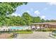 Great outdoor space with a large community pool, covered seating area, and lounge chairs for relaxing at 119 Florentino Ct, Clayton, NC 27527
