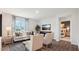 Comfortable living room with ample seating, a large window, and stylish decor for relaxation at 120 Fair Child Rd, Spring Lake, NC 28390