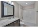 Bathroom featuring granite countertops, a sink, and a shower-tub combination at 1210 Bayview Ct, Franklinton, NC 27525