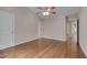 Vaulted ceiling bedroom featuring hardwood floors and doorways to other rooms at 1210 Bayview Ct, Franklinton, NC 27525