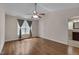 Vaulted ceiling bedroom featuring hardwood floors, a ceiling fan, and an en-suite bathroom at 1210 Bayview Ct, Franklinton, NC 27525