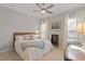 Cozy bedroom with a comfortable bed, soft lighting, and a window, creating a relaxing atmosphere at 1217 Clandon Square Rd, Hillsborough, NC 27278
