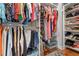 Walk-in closet with organized shelving and ample hanging space for clothes and storage at 1217 Clandon Square Rd, Hillsborough, NC 27278