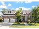 Charming brick home with a well-manicured lawn, two-car garage and inviting front entrance at 1217 Clandon Square Rd, Hillsborough, NC 27278