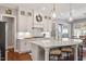 Stylish kitchen with stainless appliances, large island, and modern finishes, perfect for entertaining at 1217 Clandon Square Rd, Hillsborough, NC 27278