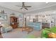 Inviting living room featuring a kitchen view, comfortable seating, and a neutral color palette at 1217 Clandon Square Rd, Hillsborough, NC 27278