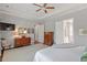 Spacious main bedroom with hardwood floors, a ceiling fan, and neutral décor at 1217 Clandon Square Rd, Hillsborough, NC 27278