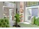 Charming window seat with patterned cushions, and built-in shelving, creating a cozy nook with natural light at 1217 Clandon Square Rd, Hillsborough, NC 27278