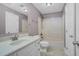 Bathroom featuring a tub-shower combo, toilet, and single sink with vanity at 1230 Sykes Rd, Spring Hope, NC 27882