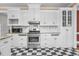 Traditional kitchen featuring white cabinets, granite countertops and a stainless steel stove oven at 1230 Sykes Rd, Spring Hope, NC 27882