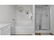 A bright bathroom showcasing a soaking tub and shower, complete with neutral color palette at 124 Lahinch Dr, Fuquay Varina, NC 27526