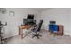 Comfortable office space with a cozy chair and natural light, perfect for remote work at 124 Lahinch Dr, Fuquay Varina, NC 27526