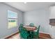 Cozy breakfast nook with bright green table and chairs; backyard views through window at 124 Lahinch Dr, Fuquay Varina, NC 27526