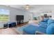 Open living area with views to backyard and seamlessly connects to the kitchen with breakfast nook at 124 Lahinch Dr, Fuquay Varina, NC 27526